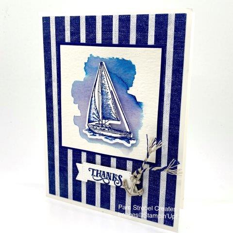 This classic nautical look features a Watercolor backdrop with die cut sail boat placed over the wash. The watercolor wash , using watercolor paper, uses only Night of Navy ink. The pools of water can pull out a purple tone in the ink. Sailing Home stamp set & Smooth Sailing dies with striped Come Sail Away Designer Series Paper. Enjoy more Sailing Home inspiration here: https://www.pamstrobelcreates.com/sailing-home-stamp-set